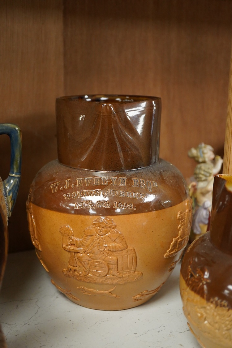 Four graduated Royal Doulton harvest jugs and a Royal Doulton Lambeth three footed jardiniere- 17cm high